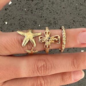 Gold Starfish and Cross Ring Set